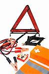 Emergency kit for car - first aid kit, car jack, jumper cables, warning triangle, light bulb kit