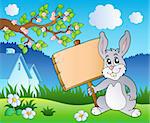 Meadow with bunny holding board - vector illustration.