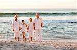 Portrait of a family beside the sea