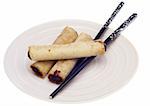 Spring Roll Appetizer with Chopsticks on a Plate.