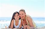 Mother with her daughter at the beach