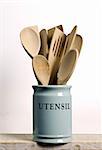 Kitchen cooking utensils; wooden spatulas etc in jar