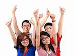 Happy students showing thumbs up and isolated on white background