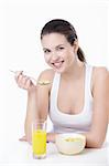 Attractive young woman lunching on white background