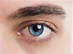 Close-up picture of blue eyes from a young man