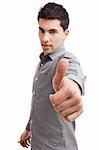 Handsome young man with thumbs up on an isolated white background, focus is on the hand