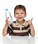 Portrait of a cute boy having a bottle of refreshing water - isolated on white