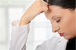 Young business woman with headache, isolated on white background