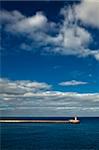 Minimalistic image showing part of the breakwater at The Grand Harbour entrance in Malta