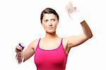 A picture of a young housewife cleaning a window over white background