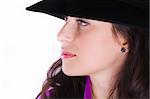 Profile of a beautiful brunette young woman with black hat
