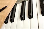 Piano Keyboard which is the old pure musical sheets