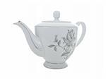 Delicate vintage porcelain tea pot on pure white background