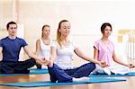 Attractive young people meditate