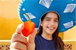 Mexican girl show habanero orange hot chili pepper mexican hat