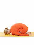 series or yoga photos. young woman relaxing in pranama pose on yellow pilated mat