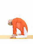 series or yoga photos. young woman in camel pose on yellow pilates mat