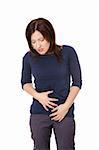 Woman holding her stomach with her hands . Pain concept