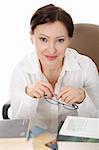 Mature student woman is learning at the desk