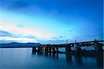 wood bridge and the sea at sunrise in nature