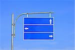 Blank road sign, three arrow blue with clear sky ready for your custom text .