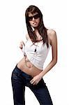 Sexy brunette woman in jeans and sunglasses wearing silver necklace on white background