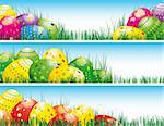 Easter banners with colorful Easter eggs in the young green grass.