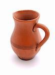 Handmade pottery clay jug isolated on white