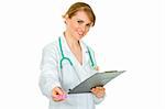 Smiling medical doctor woman holding clipboard and prescription drugs in hands  isolated on white