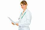 Smiling  medical doctor woman holding document in hands isolated on white