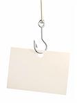 Empty sheet of a paper, hanging on a fishing hook. Isolated over white