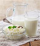 fresh milk products on old wooden table