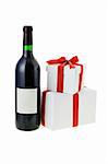 Bottle of wine and gift boxes on white background