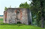 Summer evening view of Svirzh Castle dilapidated tower (Lviv Oblast, Ukraine. Built in XV-XVII th century.)