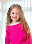 Cute little girl with long blond hair