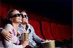 Couple in love 3D glasses in cinema