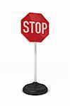 Little stop sign on a stand over white background