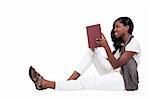 A young African American teenage woman reading a book