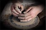 Hands of a potter. Loyalty to the traditions concept