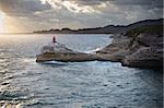 Red lighthouse on rocks in Bonifacio, Corsica, France