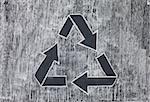 Recycle symbol on a white chalky background