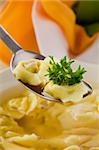 photo of delicious tortellini in bouillon