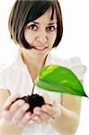 young business woman isolated on white holding green plant with small leaf and waiting to grow