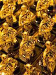 close up of an array of golden statues