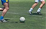 Soccer player action in motion center on a ball