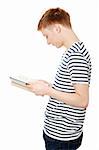 Young teen man is reading a book , isolated on white background