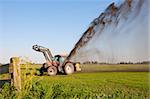 Farmer is pumping water out of a ditch