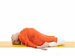 series or yoga photos. young woman in fish pose on yellow pilates mat