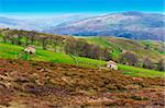 Fields on the Slopes of The Pyrenees With Old Farmhouses