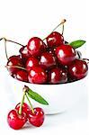 Sweet cherry in a white ceramic bowl.